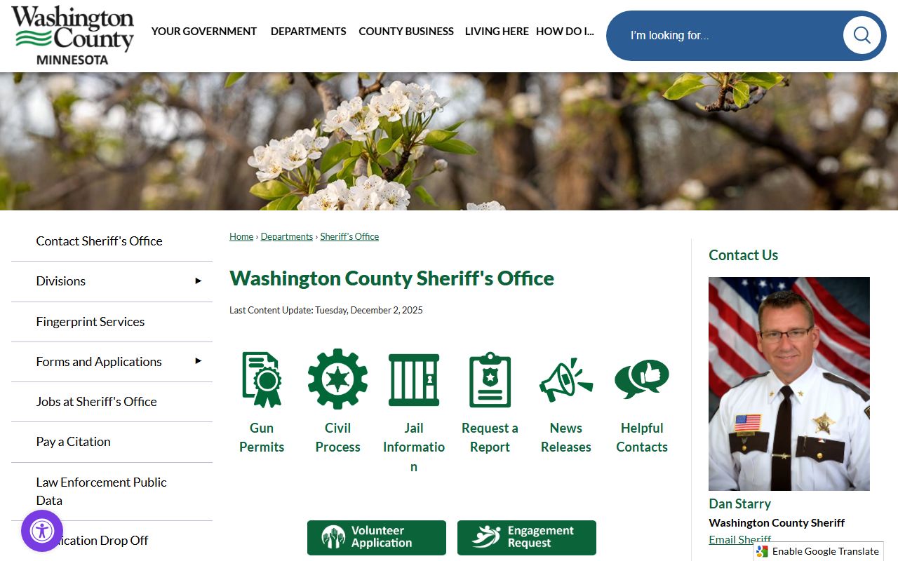 Washington County Sheriff's Office page with sheriff name, contacts, scam warning, divisions, jail, warrant, and report links